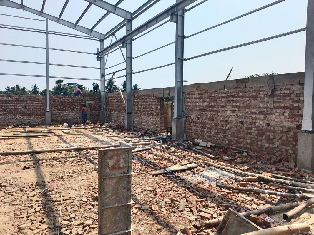 Steel framing and brick masonry seen from inside